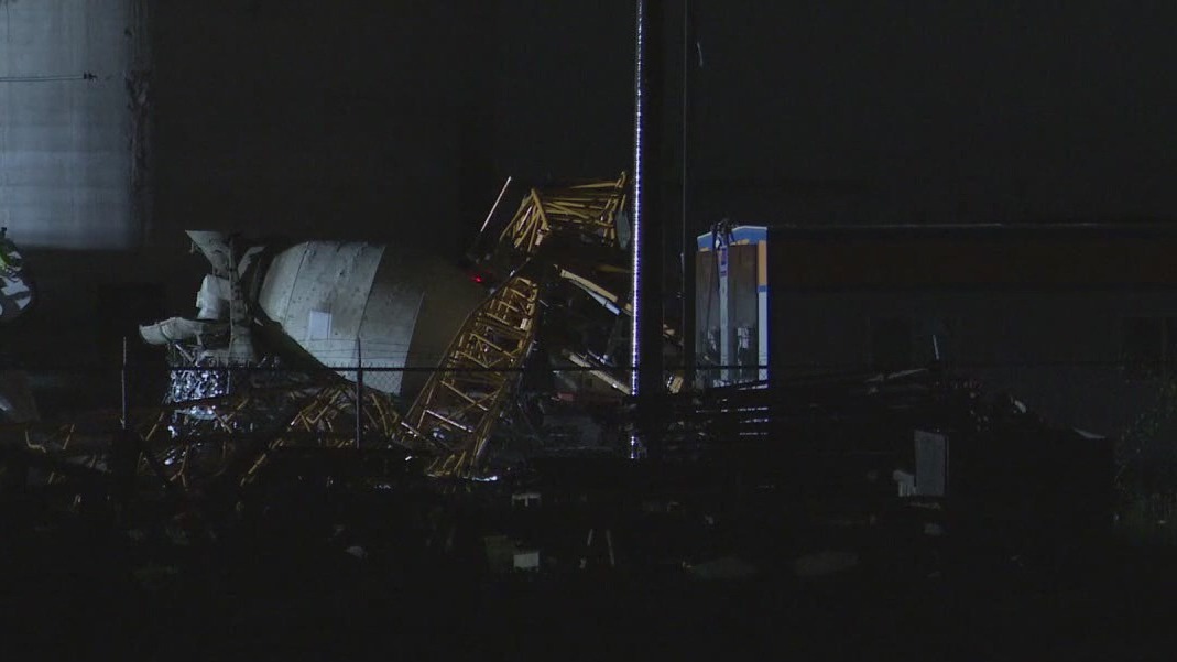 Crane falls on cement truck during Houston storm, killing man