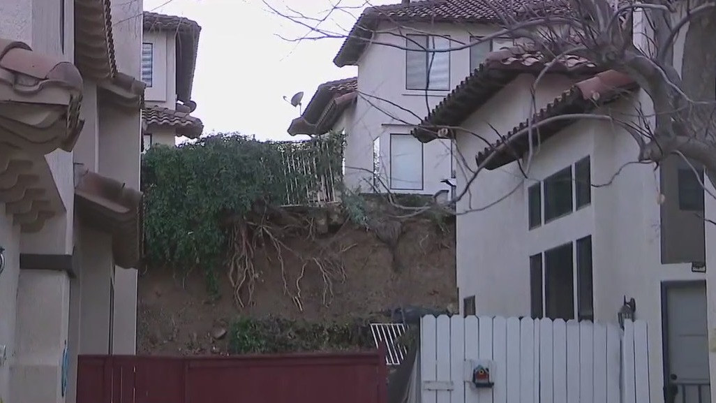 Retaining wall collapses, threatening Corona homes