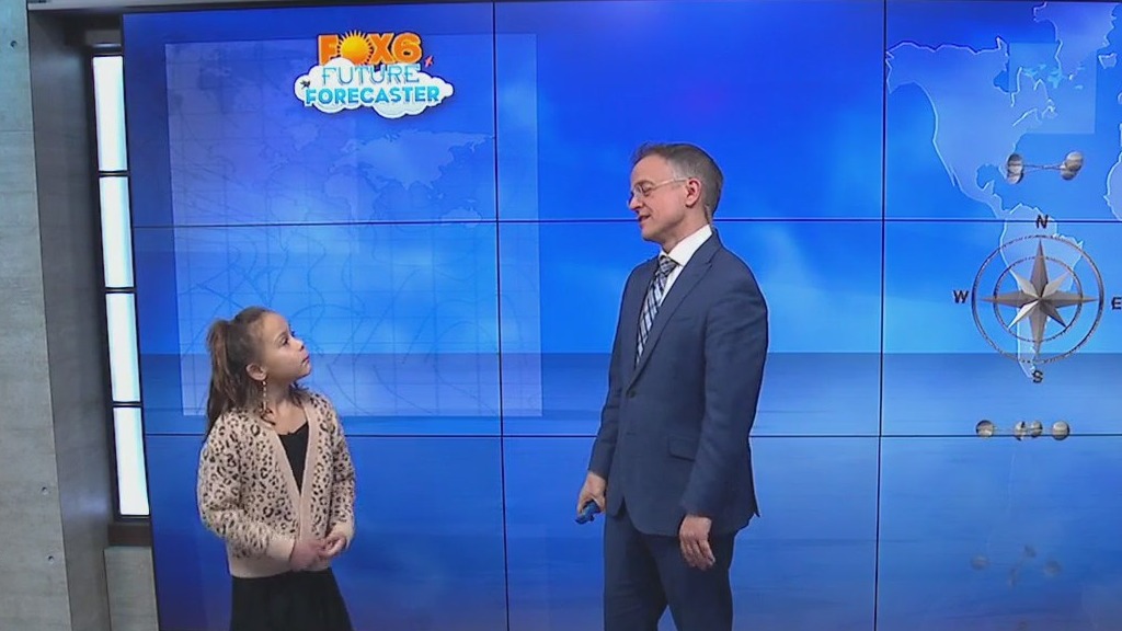 Tessa helps Rob with the weather