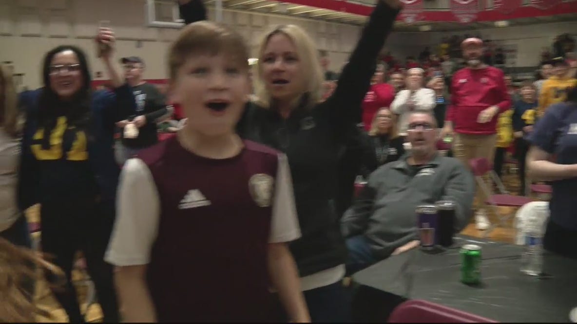 Divine Child High School goes wild after football alum Aiden Hutchinson drafted by Detroit Lions