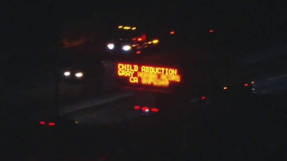 Child abducted after being left in car