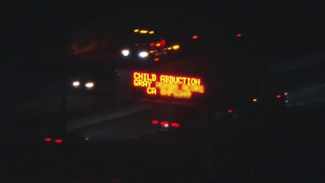 Child abducted after being left in car