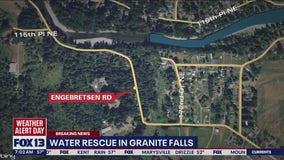Crews working to rescue woman stuck in car in Granite Falls
