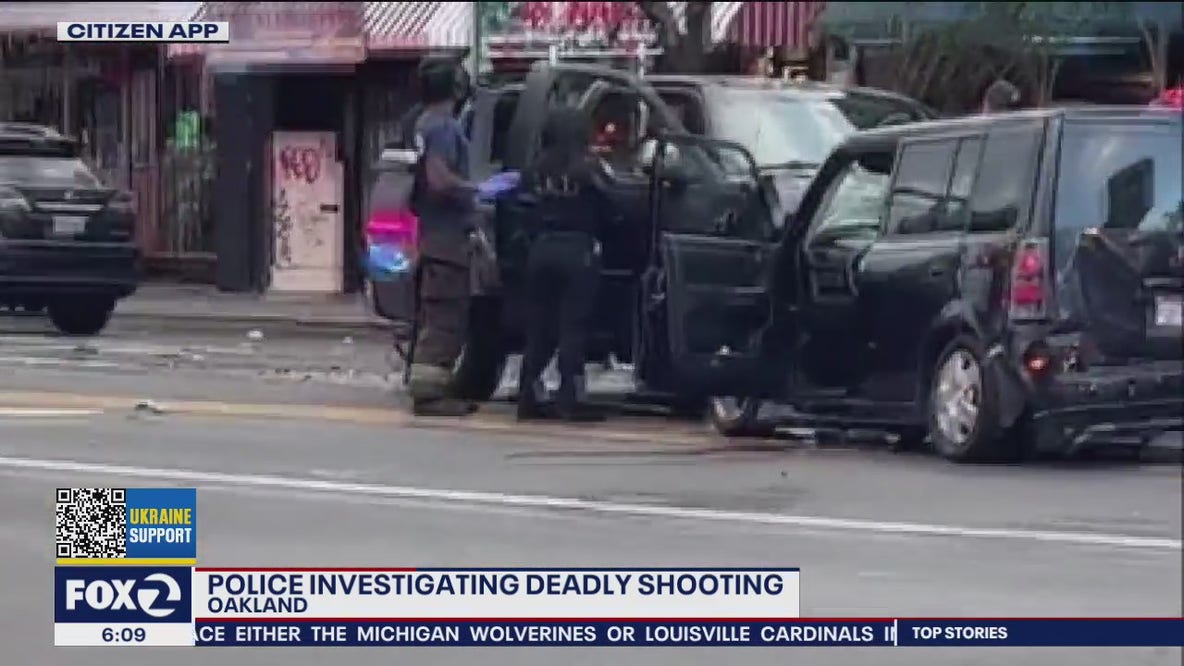 Oakland police called out to traffic collision; find man shot dead in car