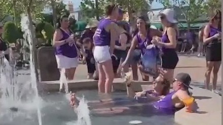 Walt Disney World visitors scolded on social media for lounging in fountain