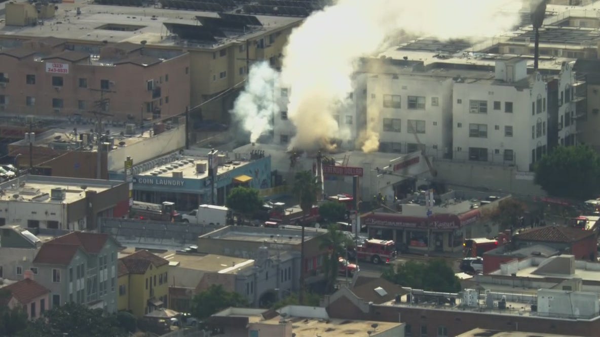 RAW VIDEO: LAFD firefighters knock down fire at Koreatown discount store