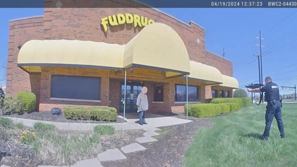 Police bodycam video of man with hatchet outside Fuddruckers