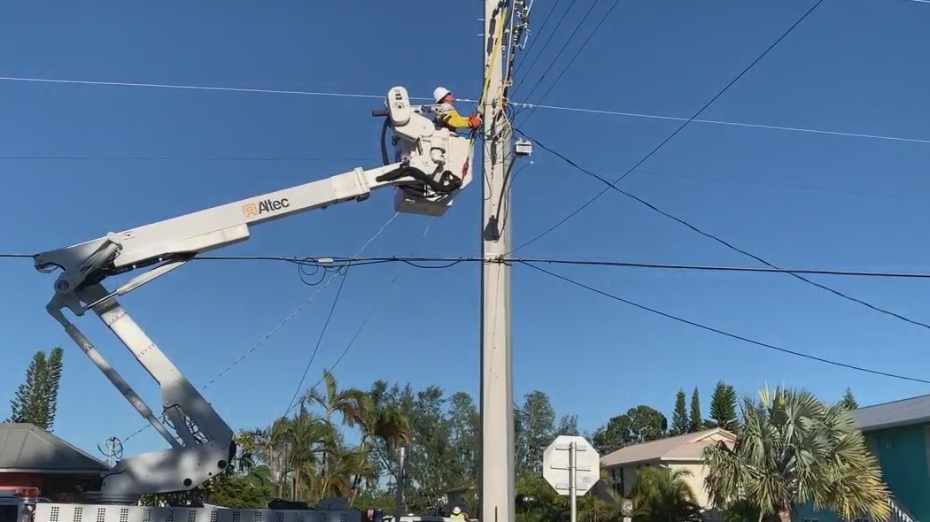 Thousands of utility workers from around the country travel to Florida to help restore power