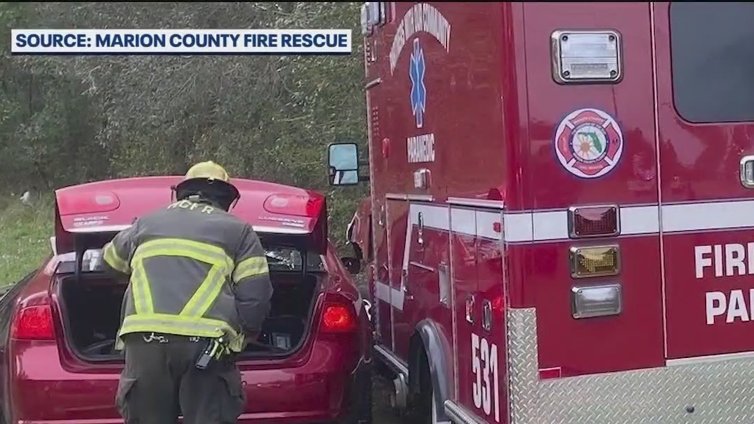 Driver cut from car after crash with ambulance