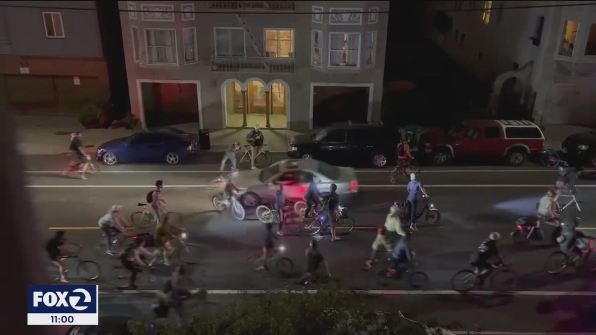 Car plows through Oakland bike party
