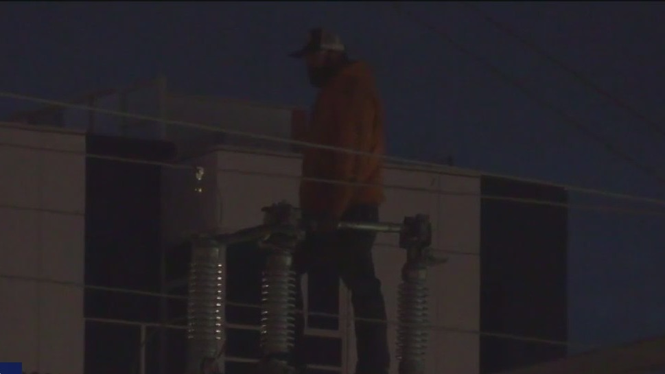 Man climbs electrical Caltrain lines in San Francisco