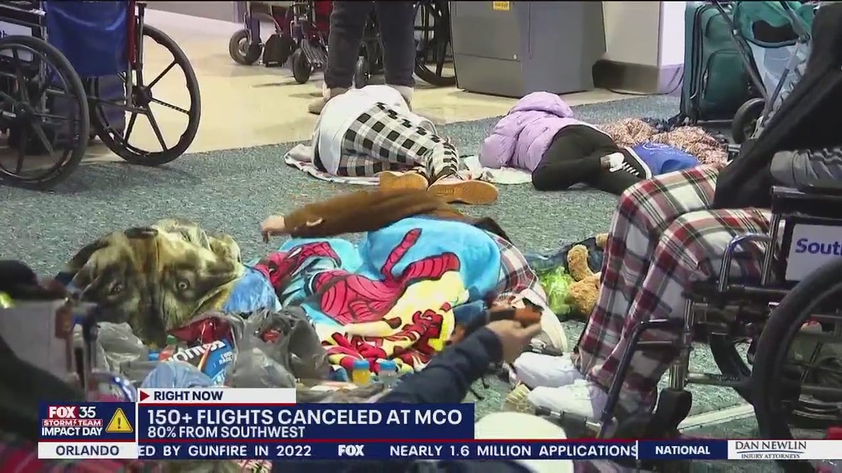 Travelers seen sleeping on floor at Orlando airport after flight delays, cancellations