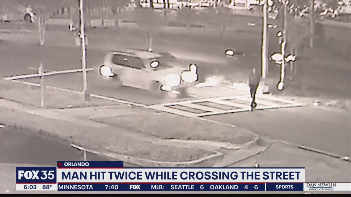 Man hit twice while crossing the street