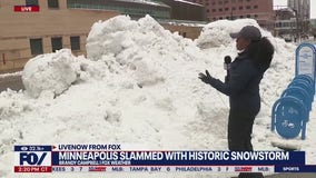 Minneapolis storms: Heavy snow ends with rain