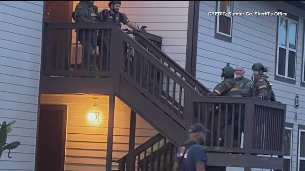 Man dives out of apartment building