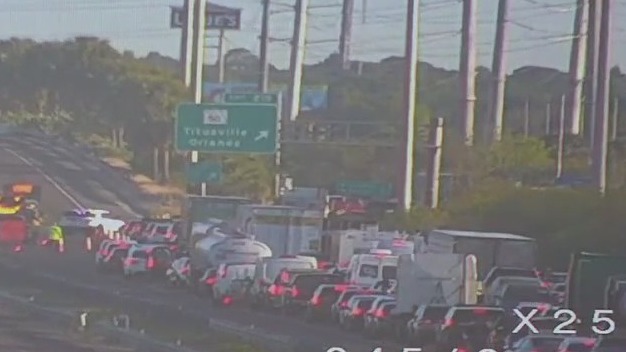 FHP: Section of I-95 shut down in Titusville after tractor trailer crashes into construction vehicle