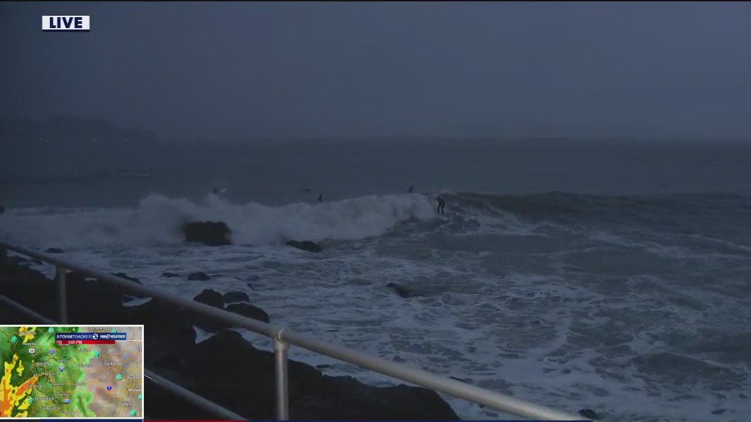 Dangerous waves attract surfers and prompt weather alerts