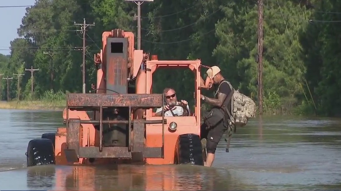 Conroe man rescued by forklift due to high waters