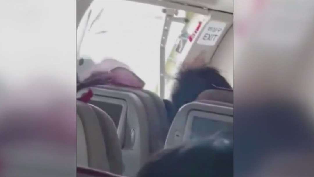 Passenger opens plane door mid-flight