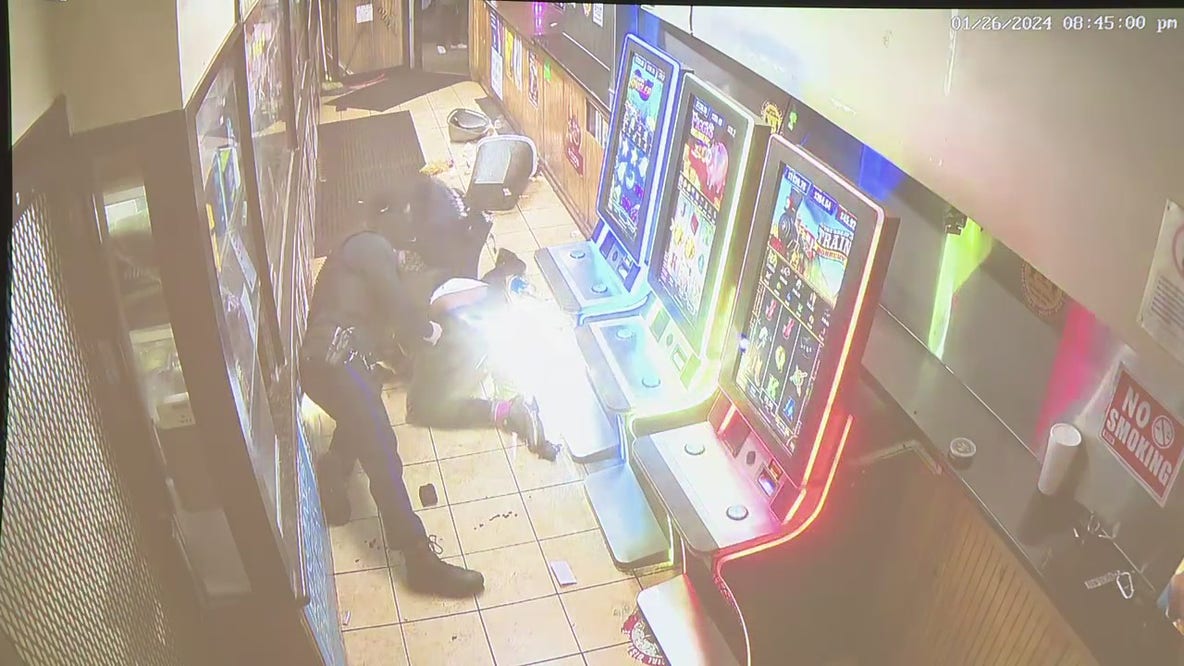 Watch: Police share video of deadly corner store shooting that injured officer