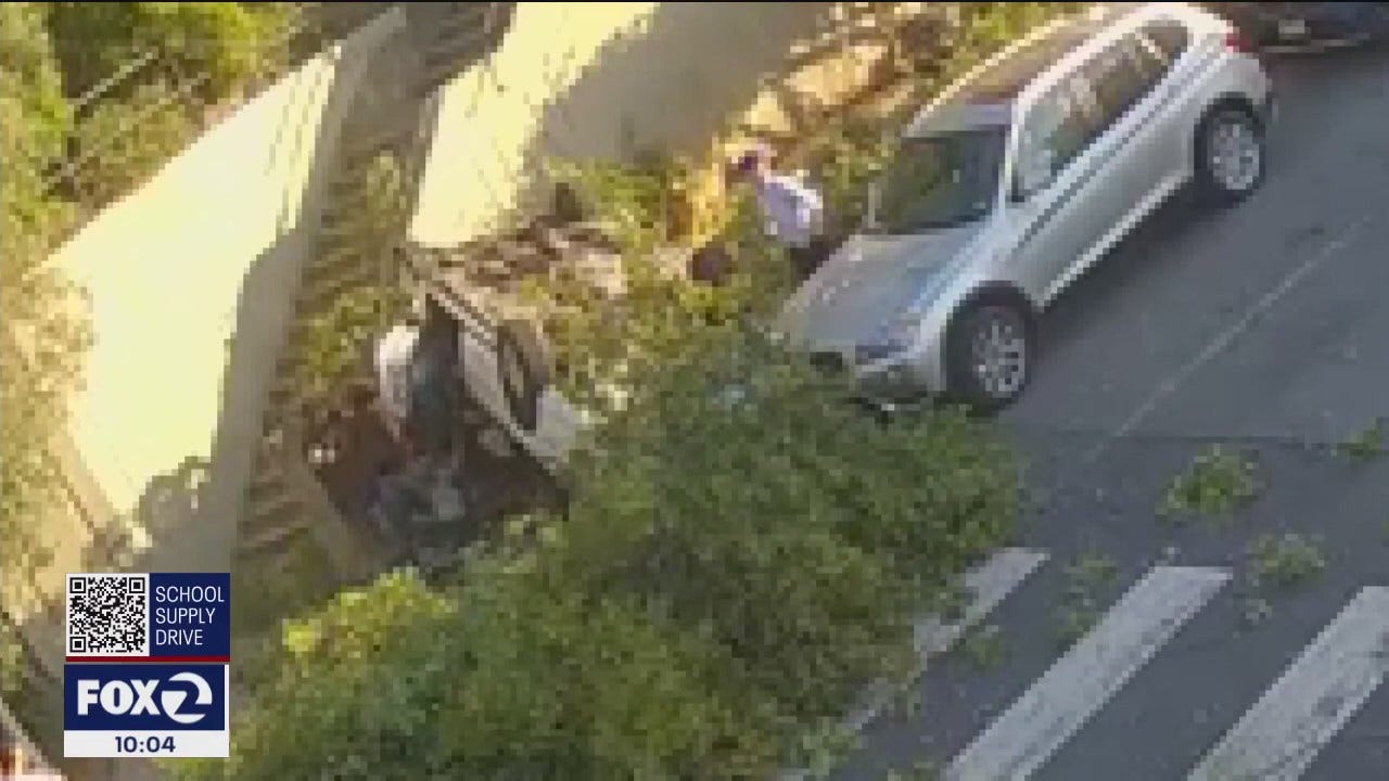 Car Lands Upside Down After Crashing Through San Francisco Barrier car-lands-upside-down-after-crashing-through-san-francisco-barrier