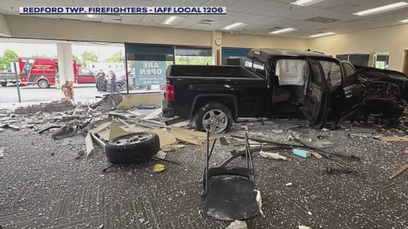 Truck smashes into Redford Township business, no injuries reported