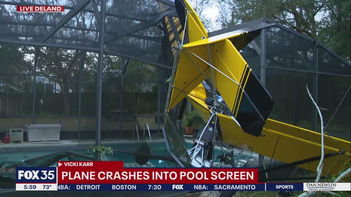 Plane crashes into swimming pool screen
