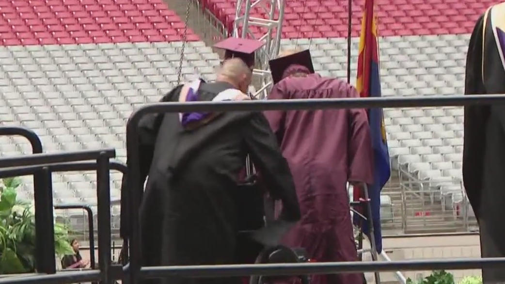 Crash survivor walks for graduation with prosthetic
