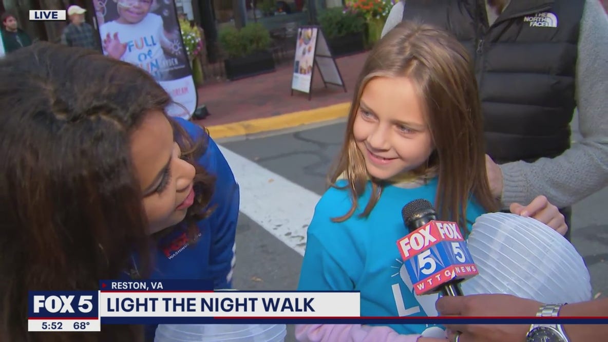 10-year-old who survived cancer attends 'Light the Night' walk