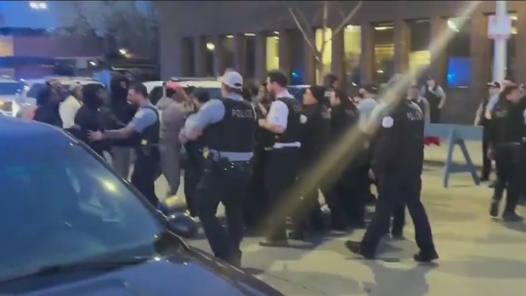 Chaos erupts outside Chicago police station after video released of deadly officer-involved shooting