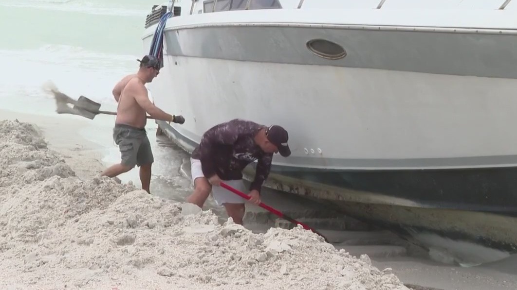 Boat washes ashore after storm in Pinellas County