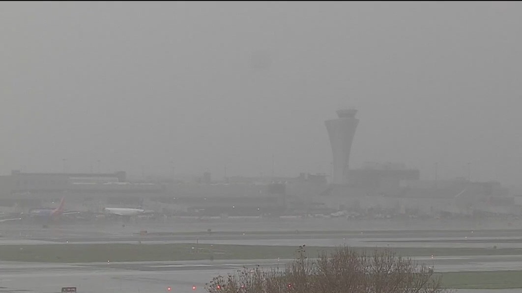 Wet weather causes hundreds of flight delays at SFO, car slides down hillside