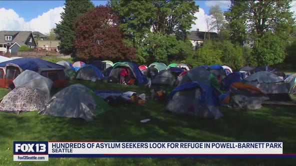 Hundreds of asylum seekers camp out at Central District park