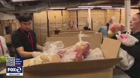 Sacred Heart volunteers prepare 4,000 Thanksgiving meal boxes