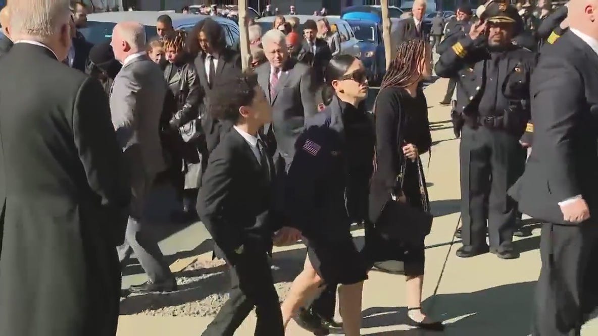 Family of Sgt. Chris Fitzgerald arrive at his funeral