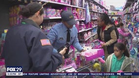Shop with a Cop event sees Philly police take kids holiday shopping