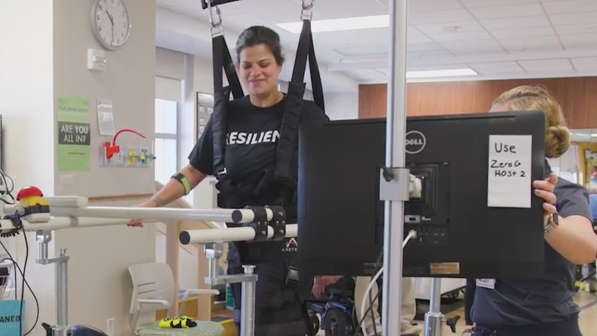 Woman learns to walk again at Orlando Hospital after COVID-19 paralyzed her