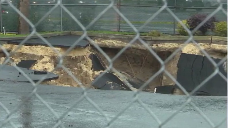 Large hole opens up in Ocala’ parking lot