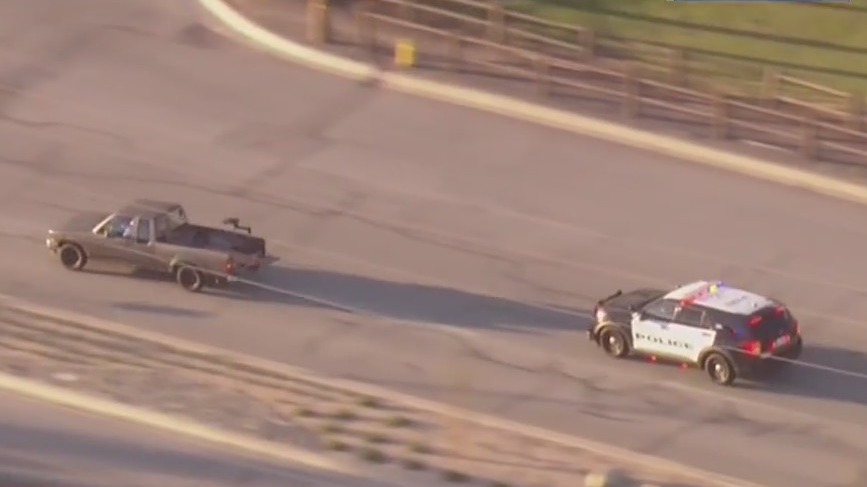 Pickup truck goes wrong way in police chase