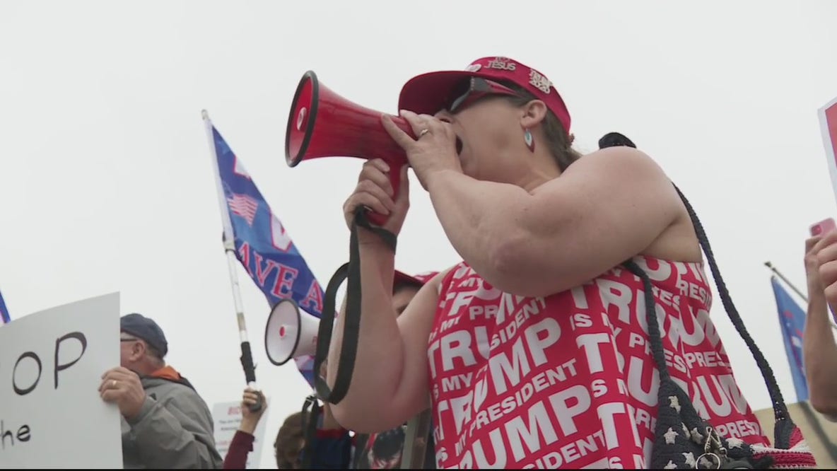 Protesters greet President Biden in Howell for visit