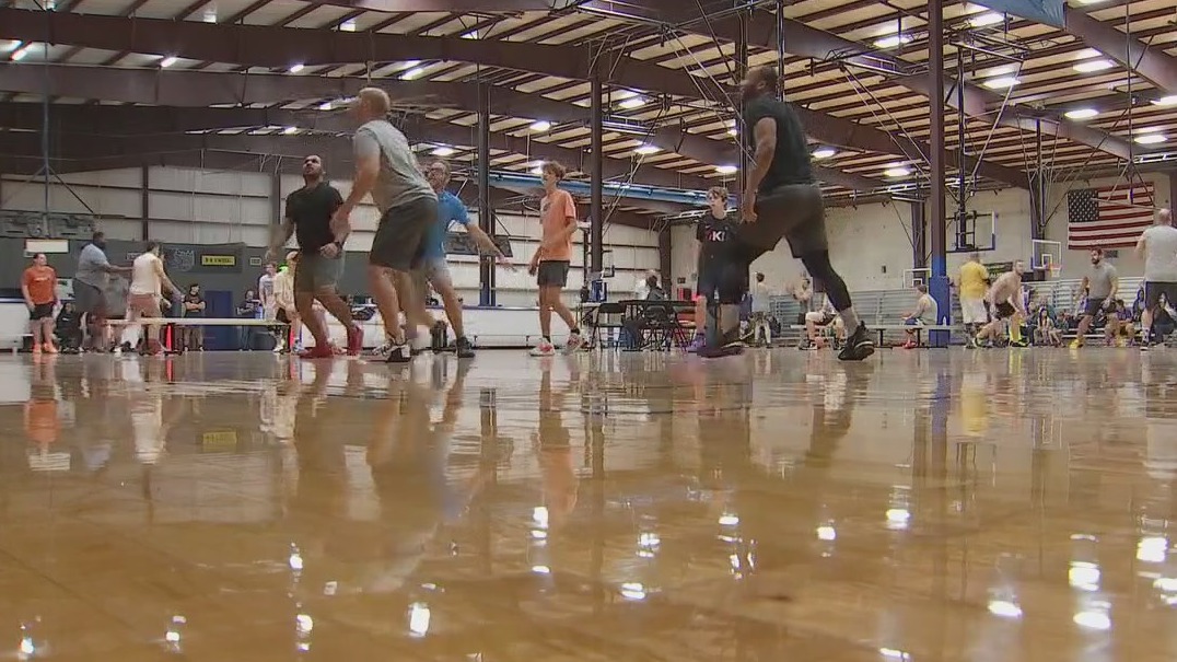 Dads shoot hoops to raise money, donations for Toys for Tots