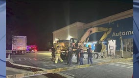 Man plows through Walmart in stolen excavator