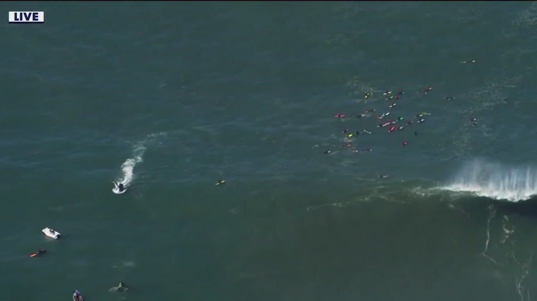 Surfers enjoy wild waves at Mavericks