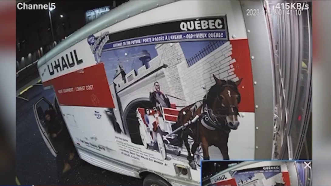 Video captures thieves reversing U-Haul into clothing store