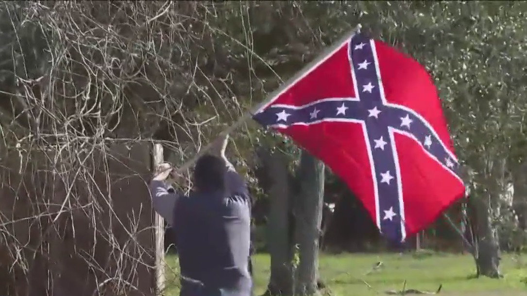 Santa Fe mom arrested for removing confederate flag off parent's property