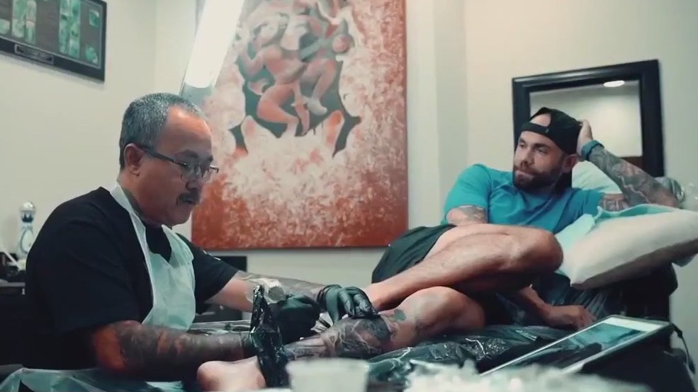 Cambodian tattoo artist finds key to freedom