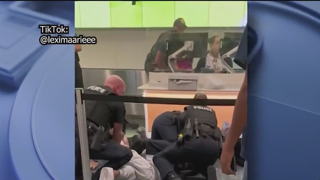 Man arrested after fight at Orlando airport