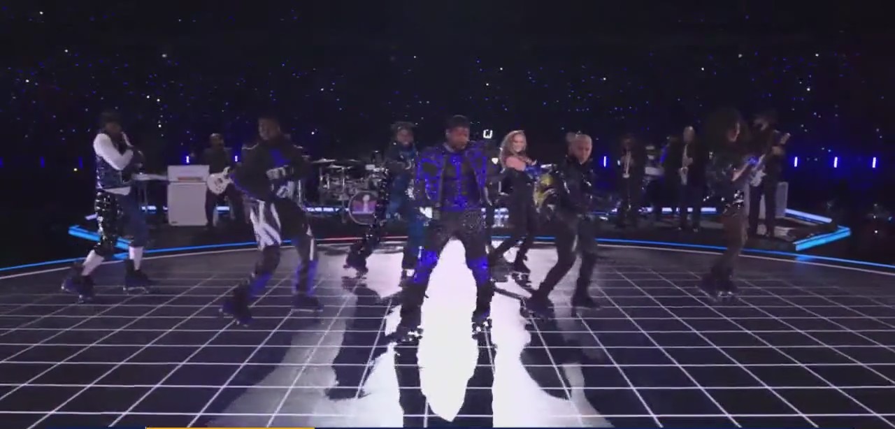 Halftime show lights up with Usher's roller skating extravaganza FOX Halftime show lights up with Usher's roller skating extravaganza FOX