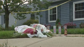 Suburban community in shock after murder of entire family