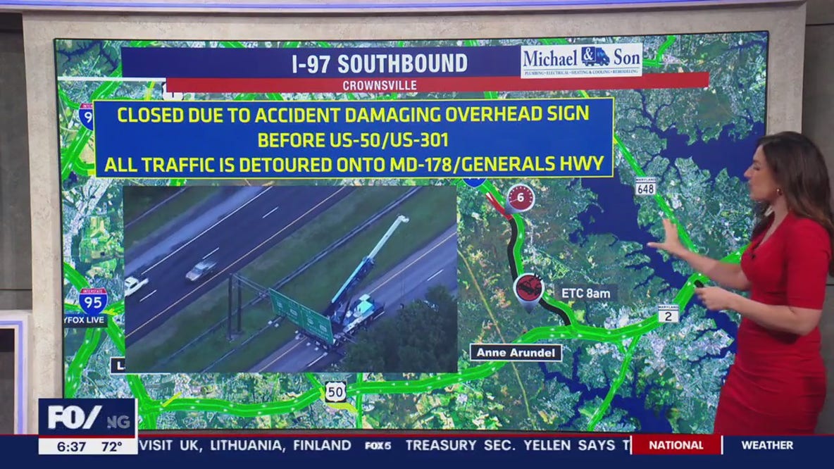 Delays on I-97 after vehicle strikes overhead highway sign